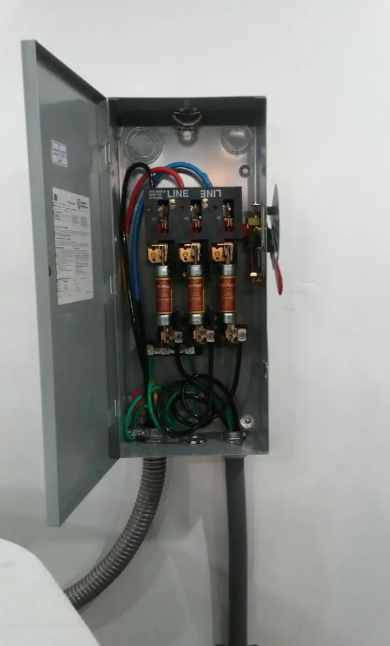 Three-phase disconnect switch installed for Smoke Detector Installation in Overlea