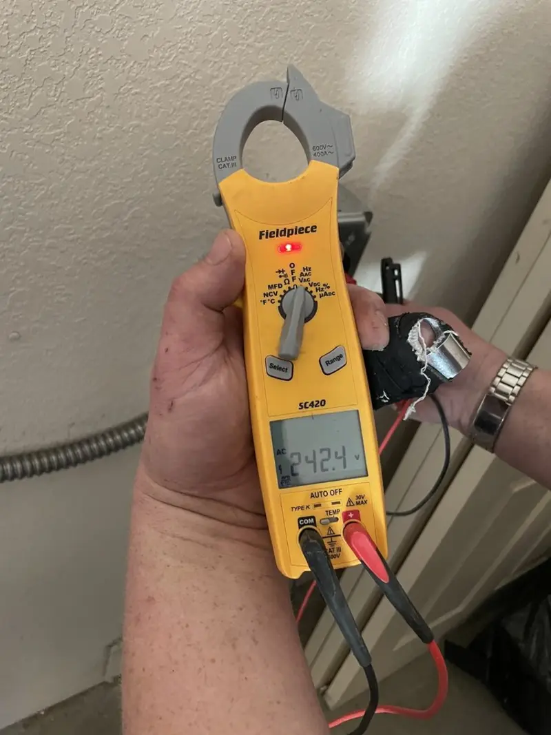 Voltage testing with clamp meter during Recessed Lighting Installation in Overlea